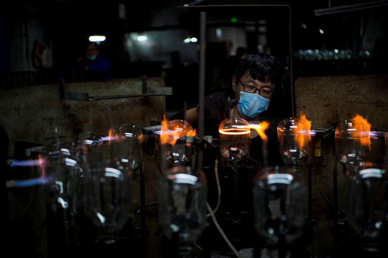 China's factory activity may contract in January, but not too sharply: Reuters poll