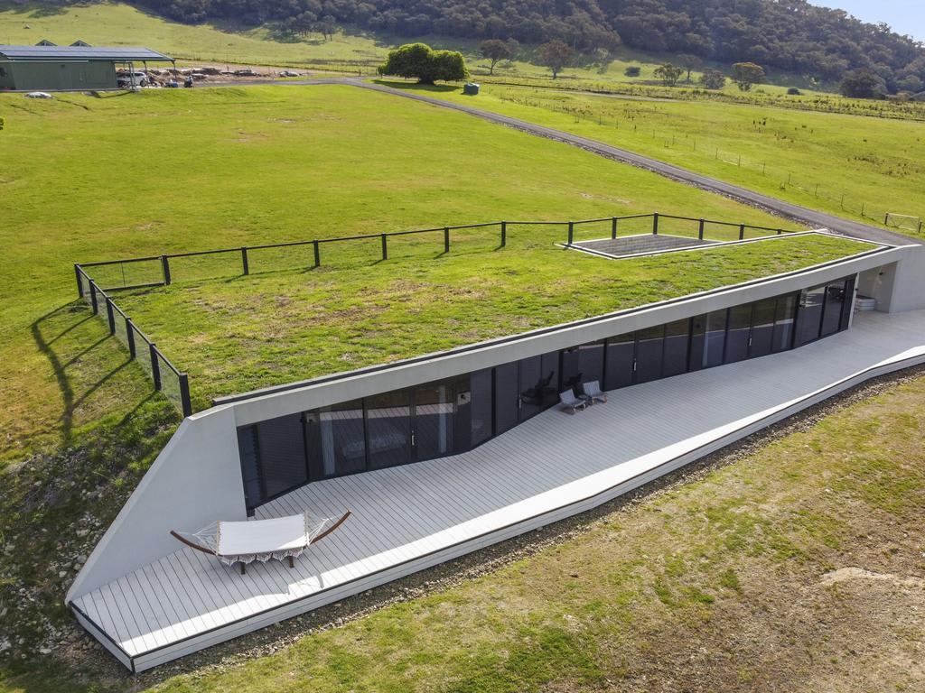 A hidden earthen house built on a hill hits the market for the first time