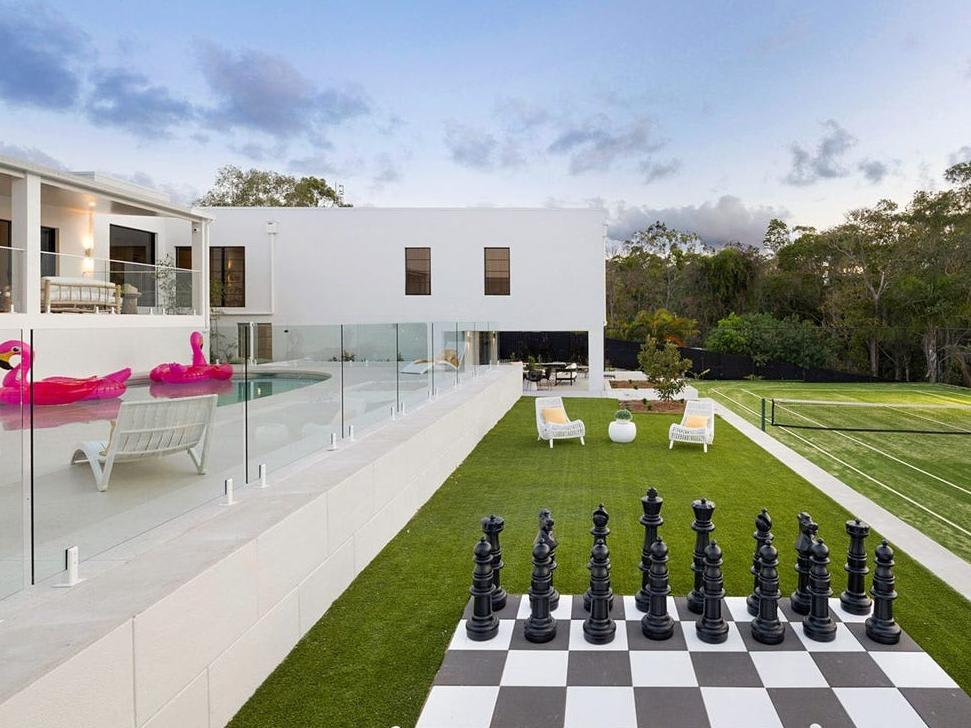 The ultimate fun home: A house with a tennis court and a giant chess board is for sale